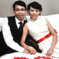 Tong Kok Wai with his wife